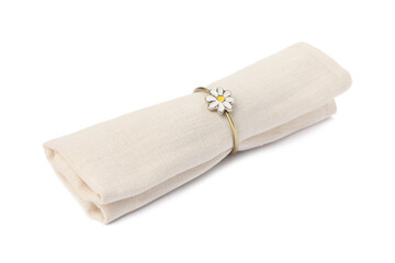 Beige fabric napkin with decorative ring for table setting on white background