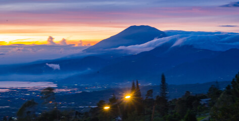 The sunrise above the Rawapening with mount Merbabu Central Java. Indonesia
