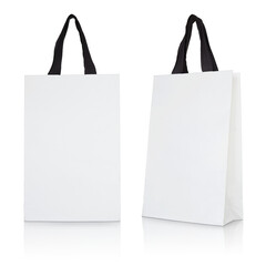 White paper shopping bag isolated with reflect floor for mockup