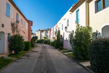 Fototapeta na wymiar Port Grimaud streets with houses and plants