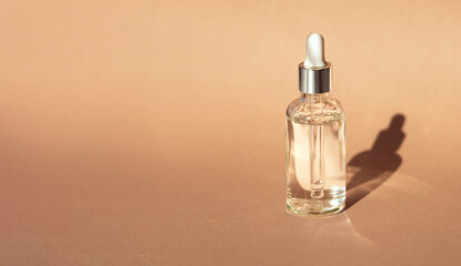 serum on a beige background with natural light