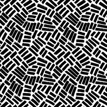 Brush drawn short stripes seamless pattern. Modern abstract background with weaven texture. Traditional hatching texture. Vector geometric tiles. Bold small lines, labyrinth and mosaic motives.