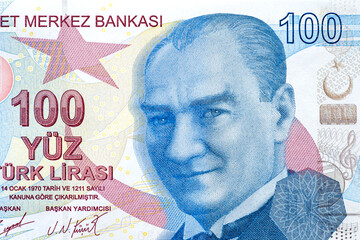 Close-up of a part 100 turkish liras with Kemal Ataturk portrait, top view as background