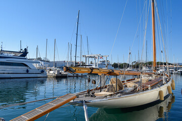 Fototapeta premium Old yacht at harbor in port Cogolin