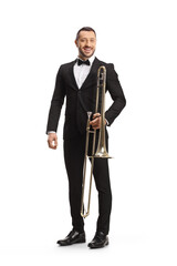 Full length portrait of a male musician posing with a trombone