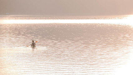 boat in the lake at sunrise