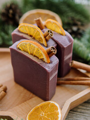Natural handmade soap bars with oranges and cinnamon sticks. Christmas set. The aroma of mulled...