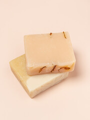 Organic soap on pink background. Handmade natural cosmetics. Soap for delicate, sensitive skin