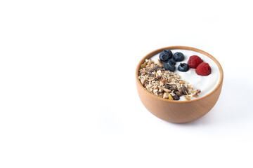 Yogurt with berries and muesli for breakfast in bowl isolated on white background. Copy space