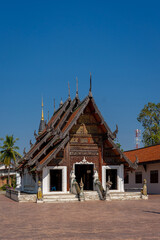 Fototapeta premium WAT PRATU PONG Temple is the Lanna Buddhist temple style of Khelang Nakhon Ancient City travel destination with old tradition and culture in Lampang Province, Northern Thailand.