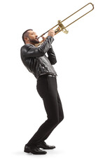 Full length side shot of a male musician playing a trombone