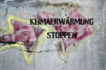 klimaerwärmung stoppen graffiti an einer mauer
