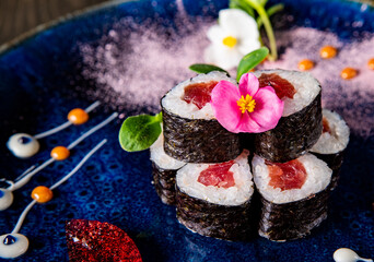 set of sushi roll in plate