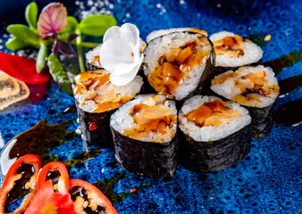 set of sushi roll in plate