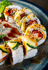 set of sushi roll in plate
