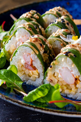set of sushi roll in plate