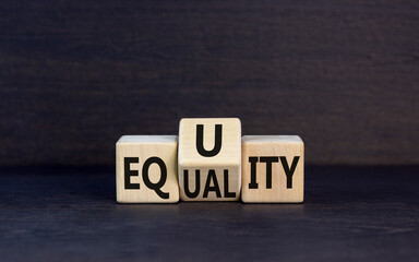 Equity or equality symbol. Concept word Equity Equality on wooden cubes. Beautiful black table...