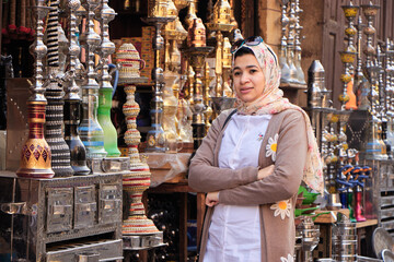Khan El Khalili market in Islamic Cairo. a tourist with a market in khan El khalilii street in...