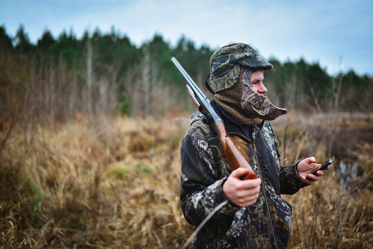 Duck hunter with a cellphone