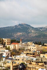Fototapeta premium قلعة الربض- قلعة عجلون- كنيسة سيدة الجبل والبلدة القديمة- عين جنا - الاردن Ajlon fort- Lady of the Mountain with town- church- ein jennah - Jordan