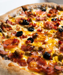 pizza with salami and olives