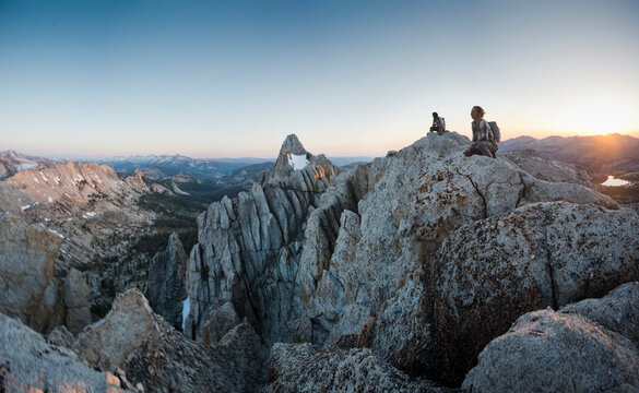 Two hikers at summit,Â TuolumneÂ Meadows, Yosemite National Park,Â California, USA