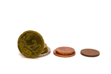 Three stacks of euro cents coins on a white background.