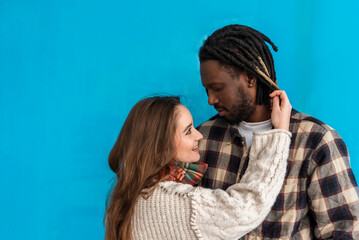 happy couple in love on the blue background