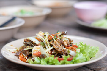 Thai spicy salad on a plate is food for health