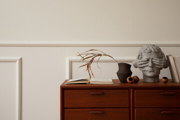 Minimalist composition of living room interior with copy space, wooden sideboard, brown vase with...