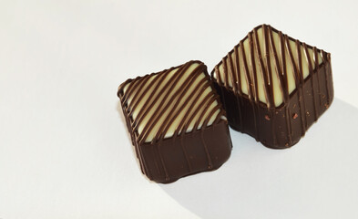 chocolates, sweet dessert. background for the design.