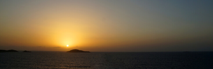Naklejka na ściany i meble orange sunset in mediterranean sea, sea panorama for natural horizontal background