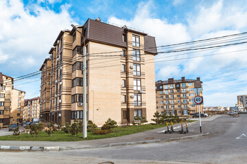 Fototapeta na wymiar urban courtyard among apartment buildings quarters modern civil architecture entrances and adjacent territory