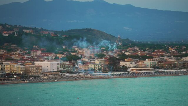 Beach and the town of Scauri in Italy.