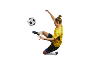 Fototapeta premium Young woman, professional female football, soccer player in motion, training, playing isolated over white background. Motivation to win