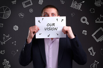 Business, Technology, Internet and network concept. Young businessman working on a virtual screen of the future and sees the inscription: Our vision