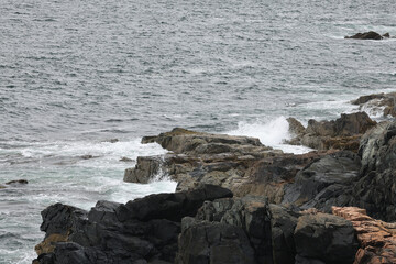 Ocean waves splashing on a rocky shore