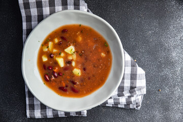 vegetables soup lentils, beans, vegetables, no meat fresh healthy meal food snack on the table copy space food background rustic top view keto or paleo diet