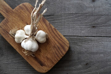 A bunch of garlic on the wooden table