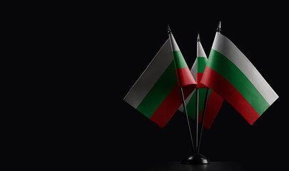 Small national flags of the Bulgaria on a black background