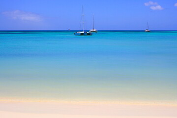 Secluded turquoise beach in Aruba, Caribbean Blue sea, Duth Antilles
