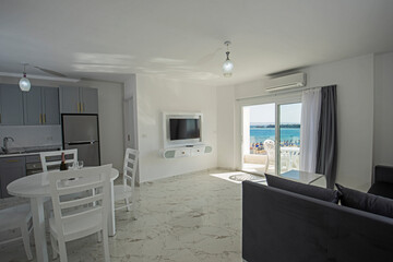 Interior design of luxury apartment living room with sea view