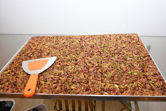 popular turkish dessert layered with pistachios''Fistikzade Kunefe' arabian wedding special sweets