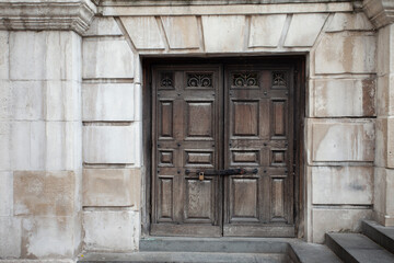 Fototapeta na wymiar Entrance Wooden Iron Doors Stone Castle Church Cathedral