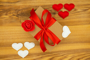 Gift box on the wooden background. Valentine's day celebration