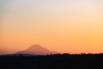 Stunning sunrise on the Red & Rose Valley in Cappadocia. Goreme, central Anatolia, Turkey