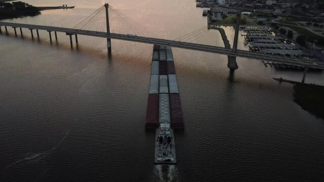 Barge under the Clark Bridge on the Mississippi river - Alton, Illinois