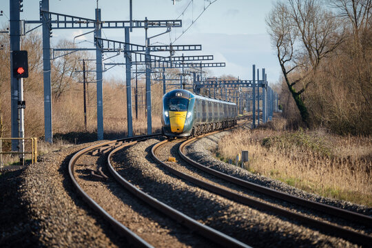 Fast intercity electric GWR train travelling to London Paddington - December 2022
