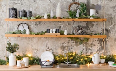 Fototapeta na wymiar Light kitchen with Christmas decorations
