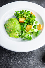 avocado salad green leaves fresh healthy meal food snack on the table copy space food background rustic top view keto or paleo diet veggie vegan or vegetarian food no meat